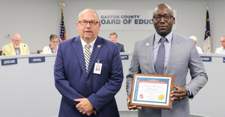 Southwest Middle School assistant principal Garey Coke pictured with Board Chairman Jeff Ramsey.